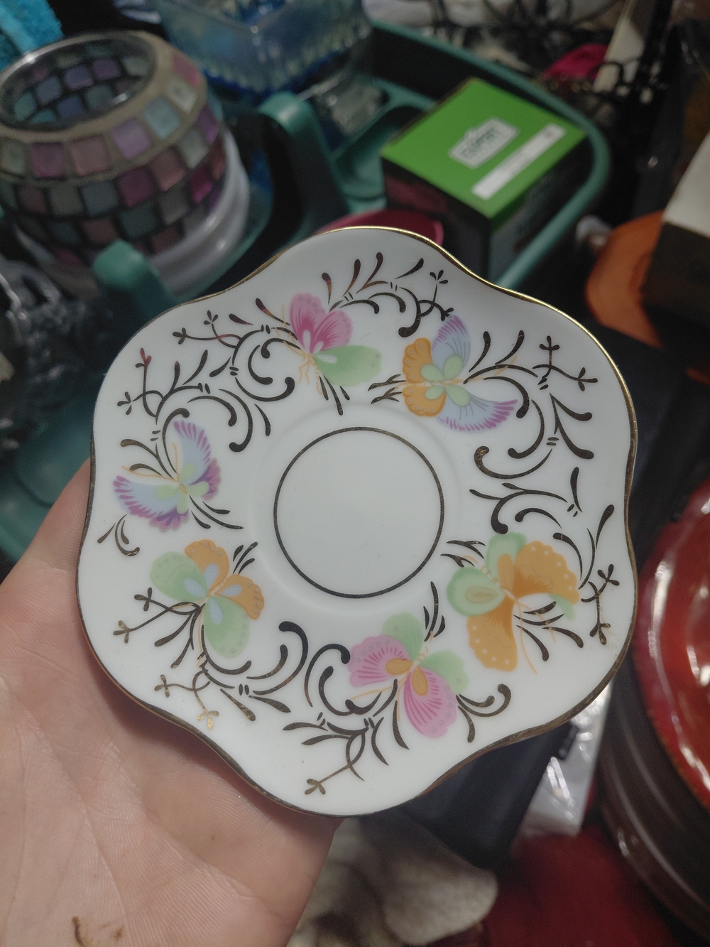 Formalities by Baum Bros. demitasse saucer featuring a colorful butterfly and fl